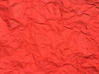 Red crumpled paper texture background for Design. Wallpaper  for copy space