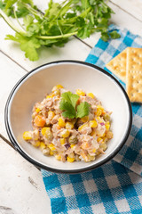 Tuna salad with mayonnaise on white background