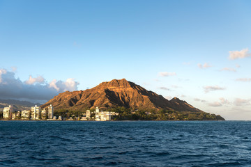 Fototapeta na wymiar View of Honolulu from a boat at sunset, Oahu Hawaii 