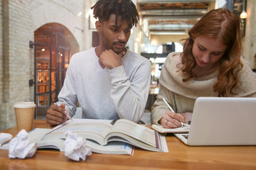 Young Students/Professionals Working in a New Project. Inspiring and Productive Day.