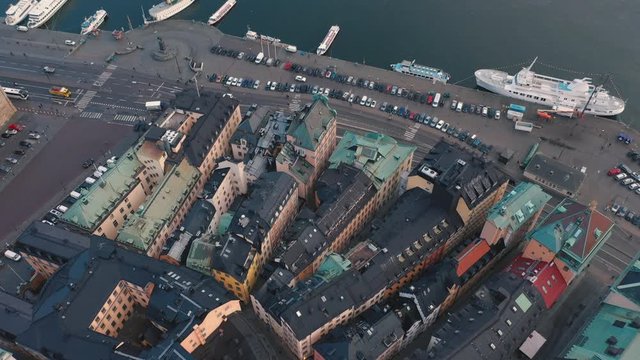 STOCKHOLM, SWEDEN - FEBRUARY, 2020: Aerial view of Stockholm city centre Gamla stan. Flying over buildings in old town.