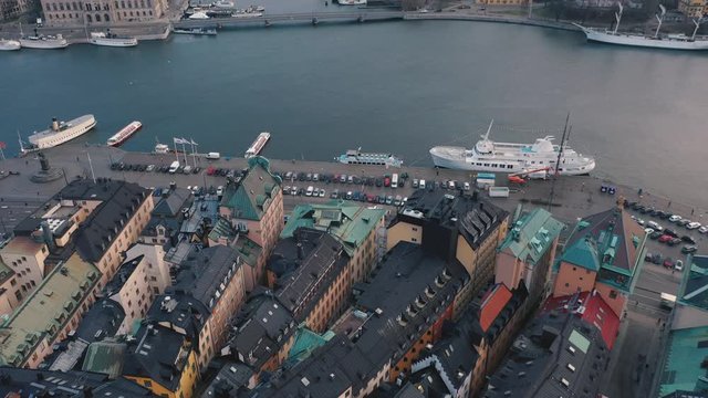 STOCKHOLM, SWEDEN - FEBRUARY, 2020: Aerial view of Stockholm city centre Gamla stan. Flying over buildings in old town.
