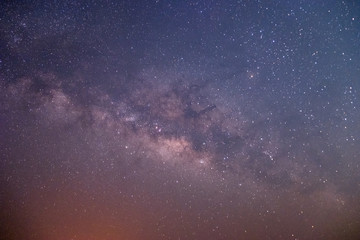The stars and the milky way in the dark sky at night are very beautiful.