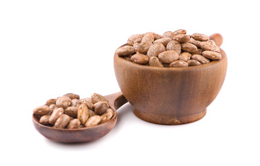 Pile of pinto beans isolated on white background