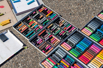 Boxes of colorful pastels ready for street art