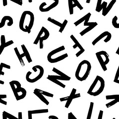Vector hand-drawn seamless pattern with alphabet. Calligraphy font. Modern brush lettering. Grunge style texture.