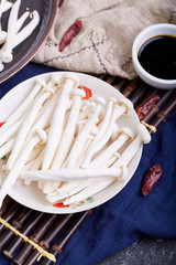 Fresh white mushrooms on a plate