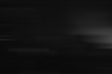 A dark and moody grainy texture combining glitch effects and photocopy-style imperfections, perfect for adding depth to creative projects. Useful for design overlays and retro-inspired backgrounds.