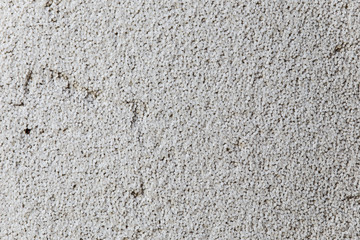 Styrofoam in a cut - texture or background. Close-up of white grey styrofoam with pattern background texture. High-quality macro photography.
