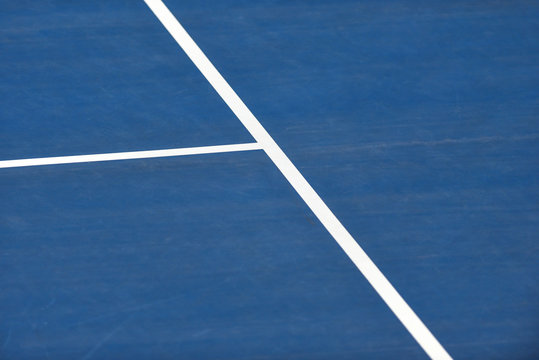 White lines on blue tennis court Stock Photo | Adobe Stock