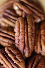 Pecan nut close-up. Pecan  macro texture. Useful products. nutrition ingredient. Low carbohydrate nutrition. Brown raw nuts background.