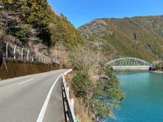 A bridge over a Japanese lake.