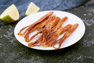 Braised duck tongue with soy sauce