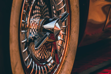 Vintage old timer car tire to show a 1920`s cinematic moody theme and nostalgia for the elegant and...