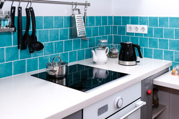 Fototapeta na wymiar Blue and white kitchen in a modern Scandinavian-style kitchen