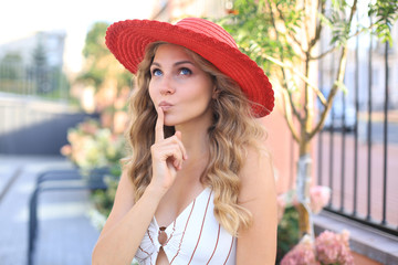 Fashion lifestyle portrait pretty woman posing in the city summer, street fashion.