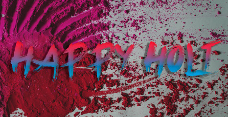 Happy Holi with gulaal in the background.