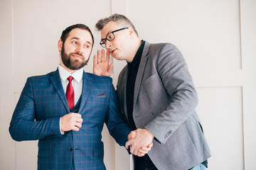 Business colleagues talking. Private discussion, small talk. Corporate and partnership concept. Gossip