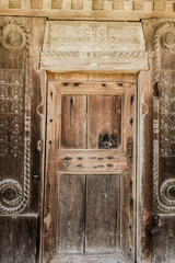 Wooden door on an old wooden church