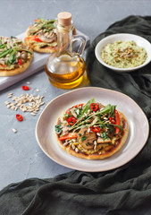 Warm, spicy Pitta, crunchy red peppers and meaty mushroom mix, parsley and sunflower seeds make this an epic toast with hummus and avocado.