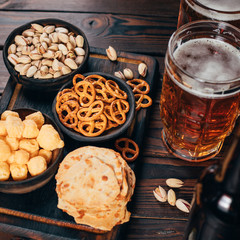 Set of appetizers, salty snacks and light beer. bar table. restaurant, pub, oktoberfest food