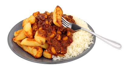 Chilli con carne meal with half chips and half rice isolated on a white background