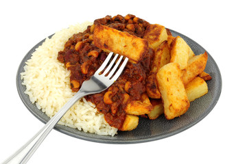 Chilli con carne meal with half chips and half rice isolated on a white background