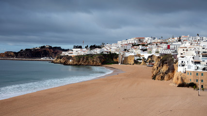 beautifull sandy beach and waves of the Atlantic Ocean. Albufeira, Algarve, Portugal. 