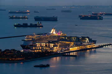 Cruise ship anchored at Singapore port at magic hour