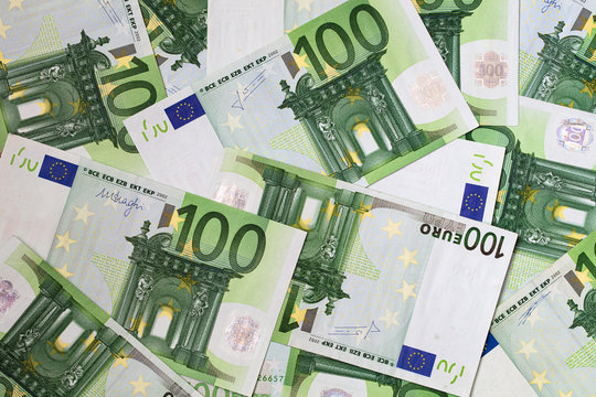 randomly laid 100 euro banknotes