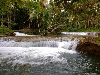 Obraz premium Big water waterfall on roadside at Naone, Maewo Is. Vanuatu
