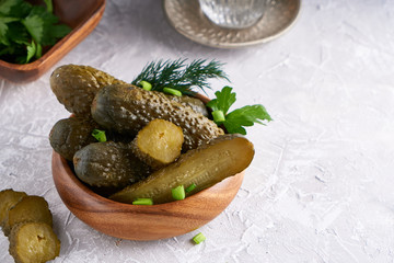 pickled cucumbers with herbs and onions in a plate on the table Probiotics food