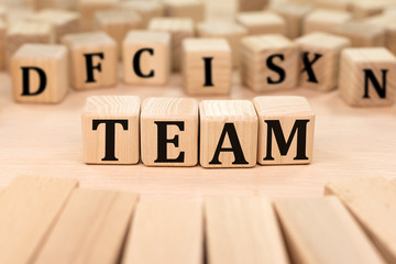 World TEAM build be wooden blocks. Concept.