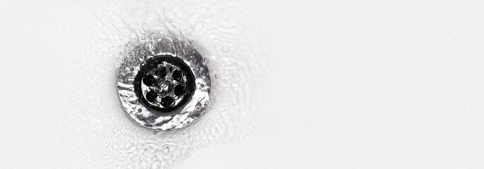water flows into a sink in a white sink, a close-up photo, panoramic mock-up
