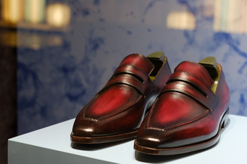 brown color man vintage leather shoes display on shelf