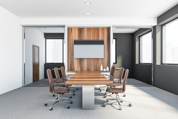 White and grey meeting room interior with TV