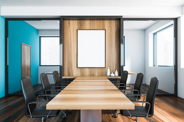 White and blue meeting room interior with poster