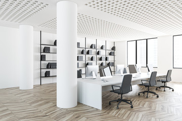 White open space office corner with columns