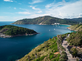 Beautiful landscape with ocean shore, small green island. Phuket, Thailand. Aerial drone view.