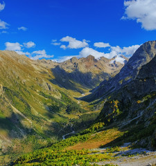 Mountain valley. Beginning of autumn. Beautiful landscape. Background image.