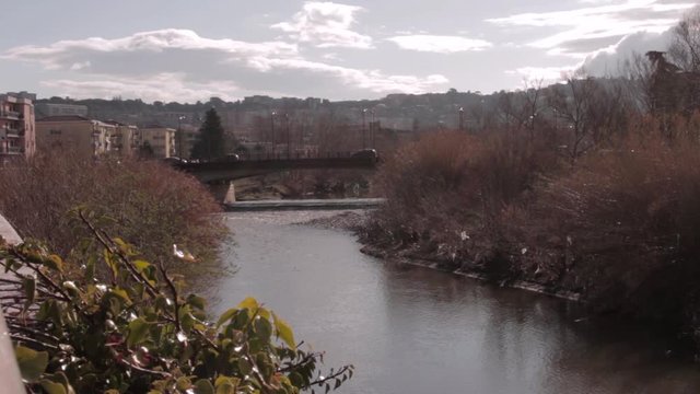 Benevento machines that cross the bridge over the river Sabato