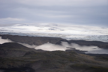 Beautiful landscape with glacier on the Fimmvorduhals trail of summer sunny day, Iceland
