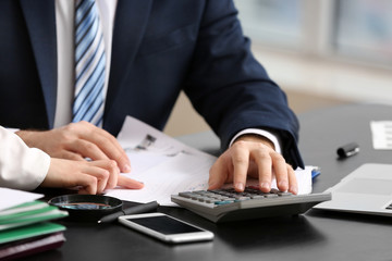 Accountants working in office, closeup