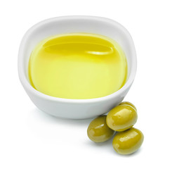 Bowl of tasty olive oil on white background