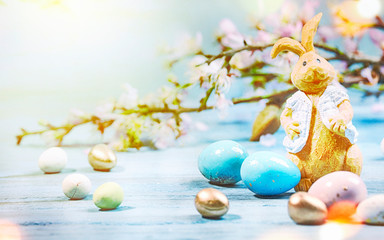 Easter background with Easter eggs and spring flowers