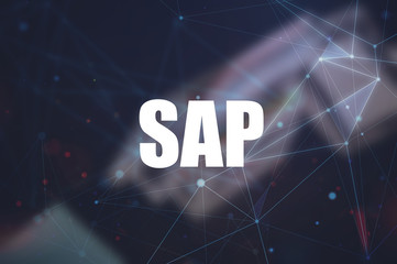 SAP word on blurring background, Business process automation software. ERP enterprise resources...