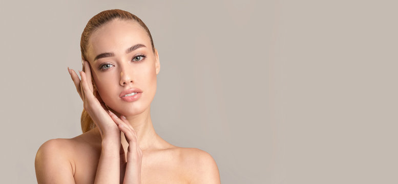 Sensual Woman Touching Face Posing In Studio, Panorama