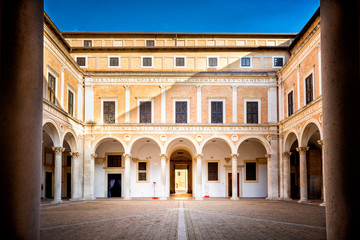 URBINO - ITALY –  Courtyard of Palazzo Ducale (Ducal Palace), now a museum, in Urbino. Marche...