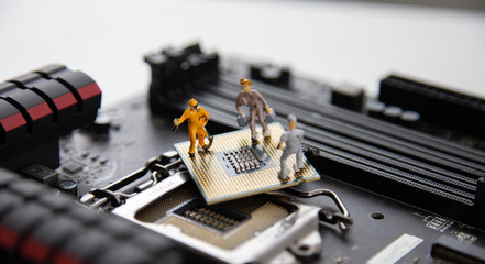 miniature people Motherboard and  CPU repair, Concept: working in technical teams,  technology systems Behind the maintenance engineering,  Computer Hardware  for memory, closeup mini top view