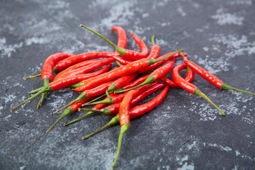 A pile of fresh red peppers